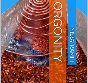 Orgonite pyramid book cover with copper coils and healing crystals for energy protection.