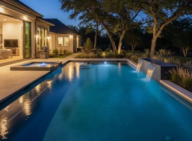 Well-lit residential pool at night in Central Texas following professional pool light repair and electrical inspection