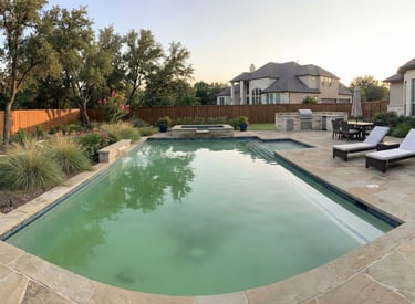 A swimming pool in Central Texas with cloudy water that needs professional pool repair services.
