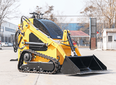 skid loaders with bucket attachment working on a small-scale excavation job