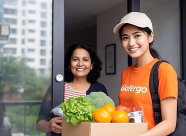 A deliver person wearing orange uniform delivering the grocery to the customer
