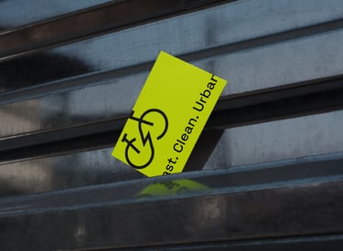 Bike logo on the lime green eco-friendly business card.