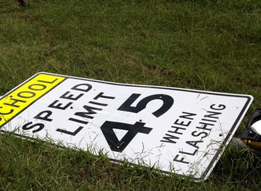 Speed limit sign on the ground