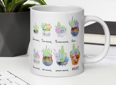 White succulent-themed ceramic mug with colorful plant illustrations — Miss Chatty Plants drinkware collection.