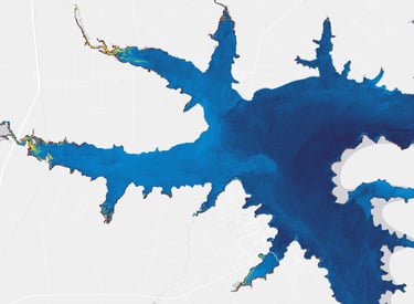 Aerial satellite view of a large blue lake map showing water depth and shoreline details for navigation.