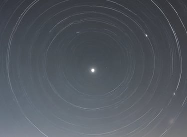 A vibrant workspace with a laptop displaying coding tutorials.