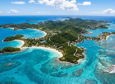 Aerial view of Antigua island coastline featuring turquoise Caribbean waters, white sand beaches, an