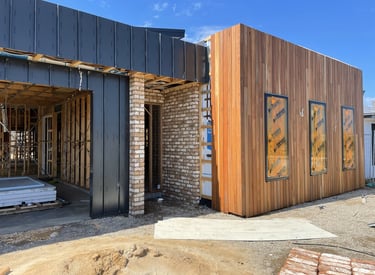 timber cladding being done on front of house
