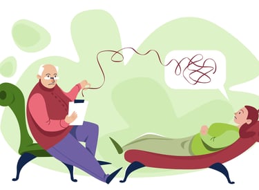 a man sitting in a chair with a woman in a chair