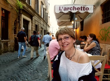 Lady Michelle prepares for street side dinner in Rome, Italy