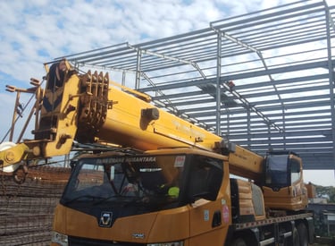 Mobil crane 25 ton kontruksi baja