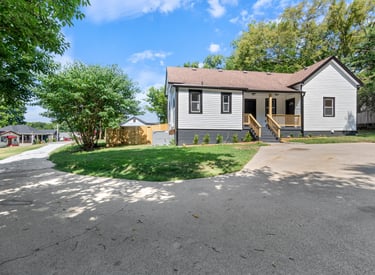 a house with a driveway and a driveway with a driveway