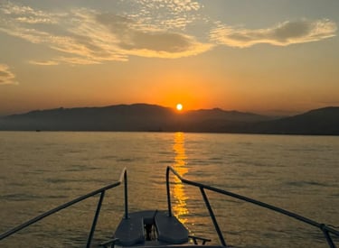 Sunset aperitif during a private boat tour in Liguria