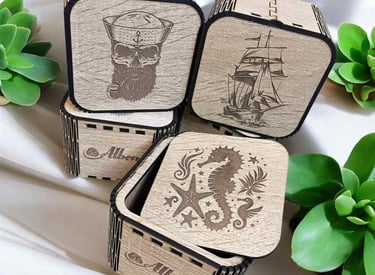 a group of four wooden boxes with a pirate ship on it