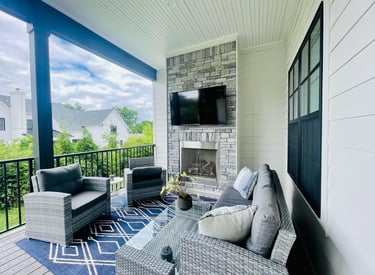 Outdoor tv mounted over stone wall. 