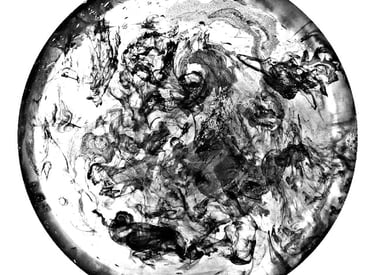 a black and white photo of a circular object