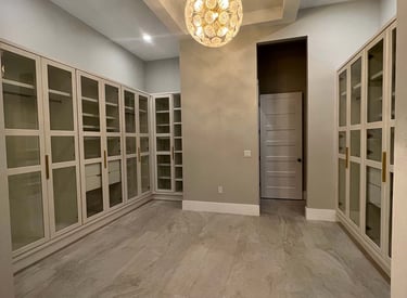 Picture of walk-in closet created by White and Wood Custom Carpentry in Orlando Florida