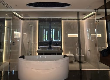 a bathroom with a large tub and a large tub