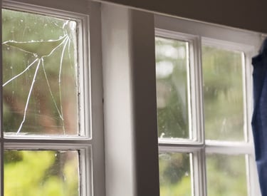 broken glass in timber window
