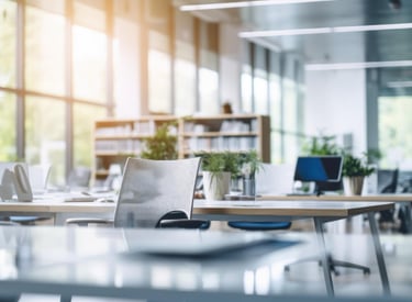 Professional office movers carefully packing and relocating furniture and equipment 