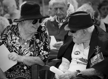 Photographer, Peter Pickering, captures a poignant moment an old couple share a story