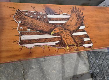 wood burned American flag and a bald eagle