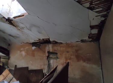 arbeo cherbourg manche vétusté état bâtiment ancien existant fissure infiltration d'eau expertise