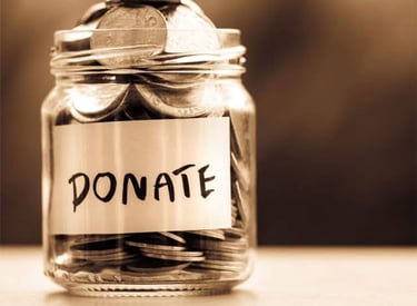 a jar of coins says donate green Way Association