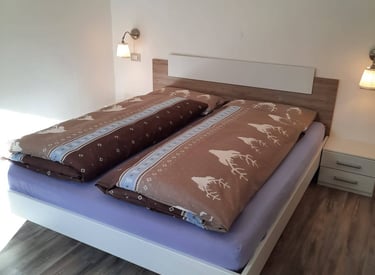 alt="letto extra large appartamento affitto val di Fassa"