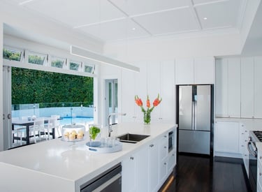 white kitchen in renovated bungalow