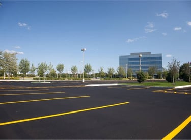 Painting parking lot with a trueline parking lot paint line marking striping machine
