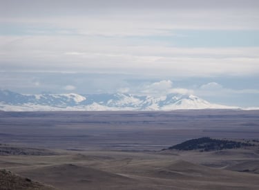 View of the Rockies looking West from atop a mountain in White Sulphur Springs MT