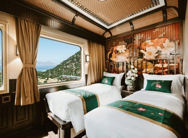 Golden Eagle Vietnam Express luxury sleeper train twin cabin with panoramic views.