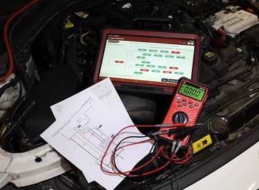 Diagnostic tools being used on a car