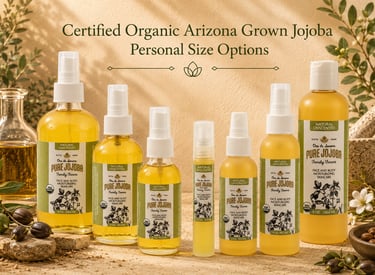 Collection of organic Arizona grown Pure Jojoba oil bottles in various personal sizes for moisturizing skincare.