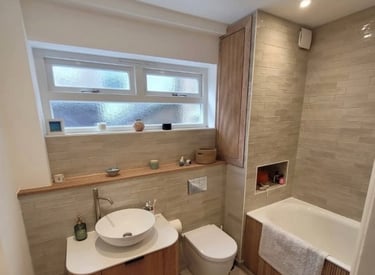 Beige and White Bathroom refurbishment by Roman Refurbs in Cheshunt UK