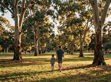 A cinematic, wide-angle shot of a parent and child walking hand-in-hand through a sun-drenched Australian park with eucalyptus trees. The lighting is warm and golden, reflecting the Oceania region, conveying hope and a positive future.