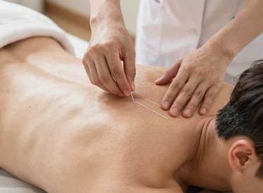 Close-up of hands applying therapeutic massage with artistic brush strokes overlay.