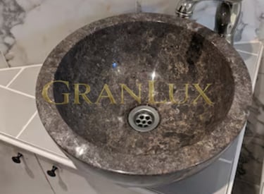 Раковина з дідковицького граніту
