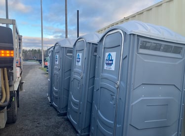 A row of portable toilets 