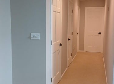 Interior hallway remodeling with new doors and paint by Renjay Remodeling, CT