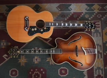 Two vintage guitars belonging to the band Sickle Moon