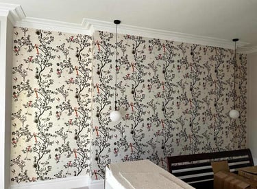 Floral wallpaper installation in living room, completed by Pure Perfection on Balham
