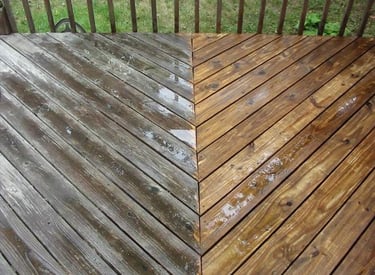 Before and after power washing a wooden deck.