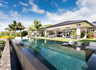 a pool with a view of a house