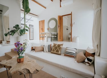 a living room with a couch and a table