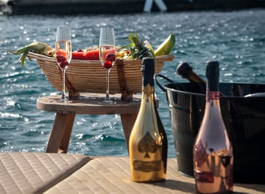 a table with a bottle of wine and a bottle of wine