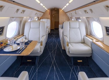 a large airplane with a table and chairs