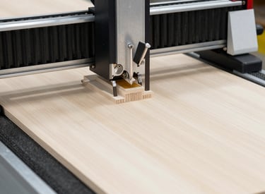 Close-up of plastic thermoforming machine in action.