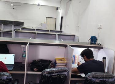 Students studying at Aura Library Bhopal with Comfortable study desks and chairs